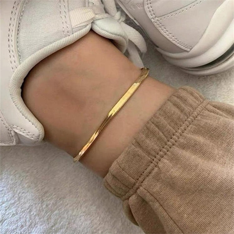 GIA GOLD HERRINGBONE FUSSKETTE